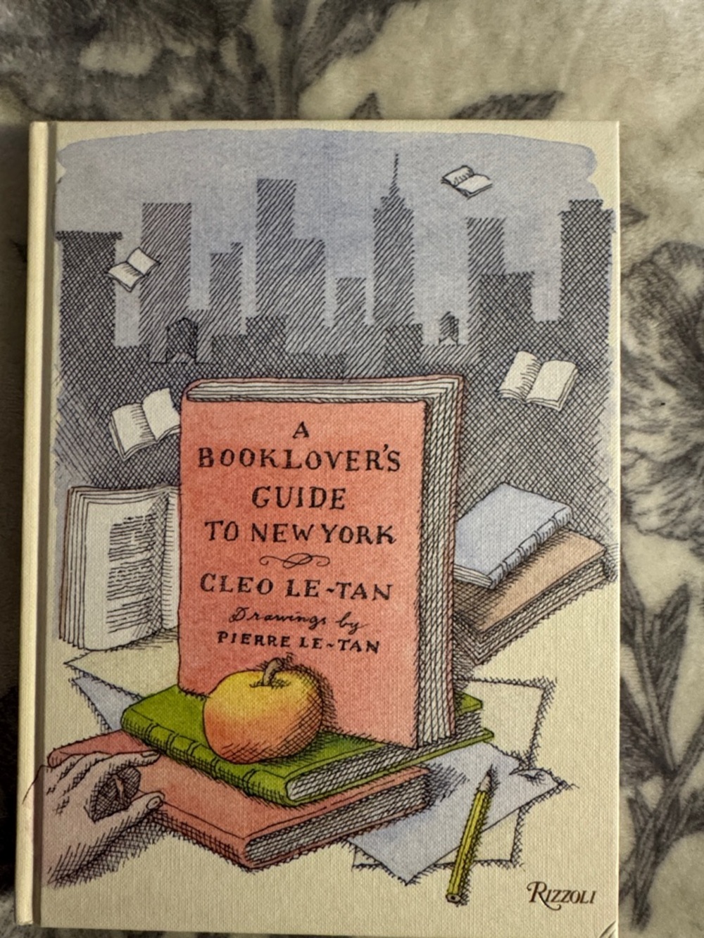 Rizzoli Decorative Book Cover – Pink, Green & Cream Cityscape Illustration